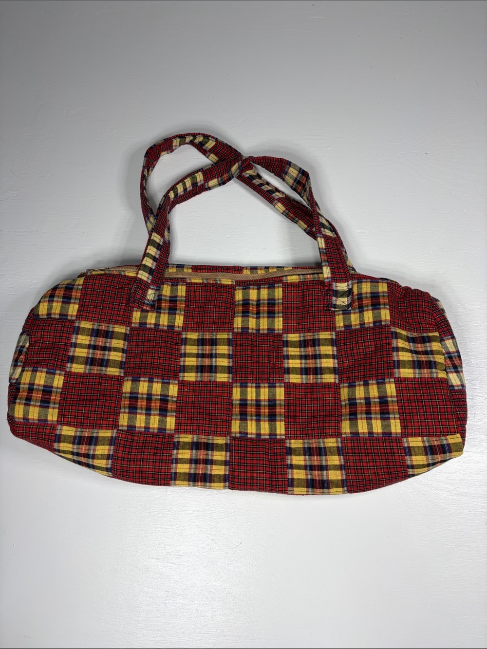 Handmade quilted duffel bag plaid outside with floral lined inside